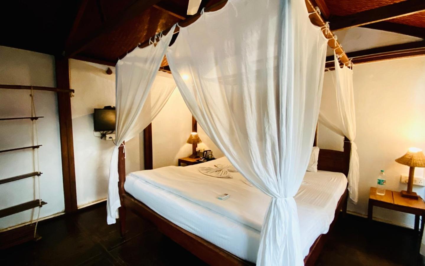 Village Susegat Beach Resort Morjim Dış mekan fotoğraf