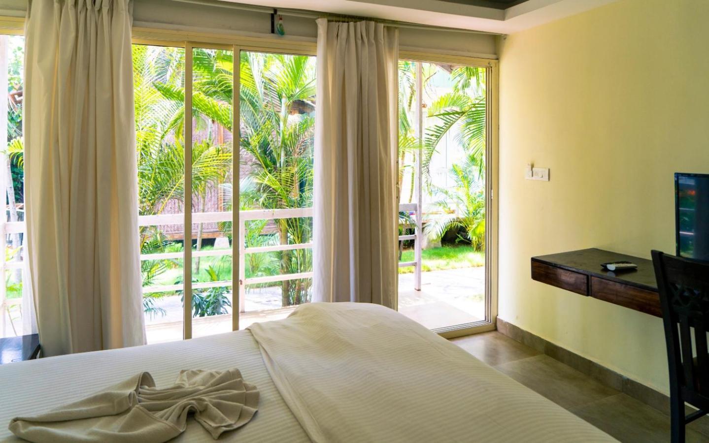 Village Susegat Beach Resort Morjim Dış mekan fotoğraf